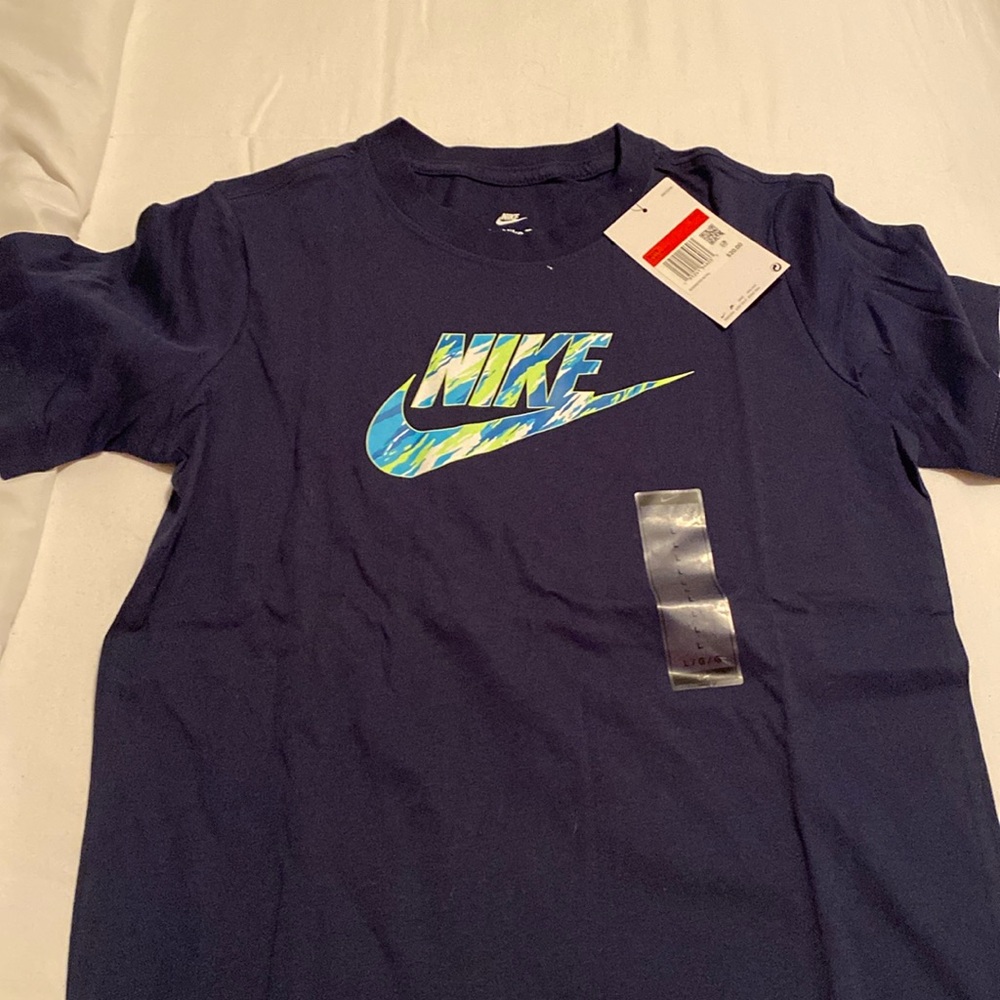 Boys Nike size L tee.